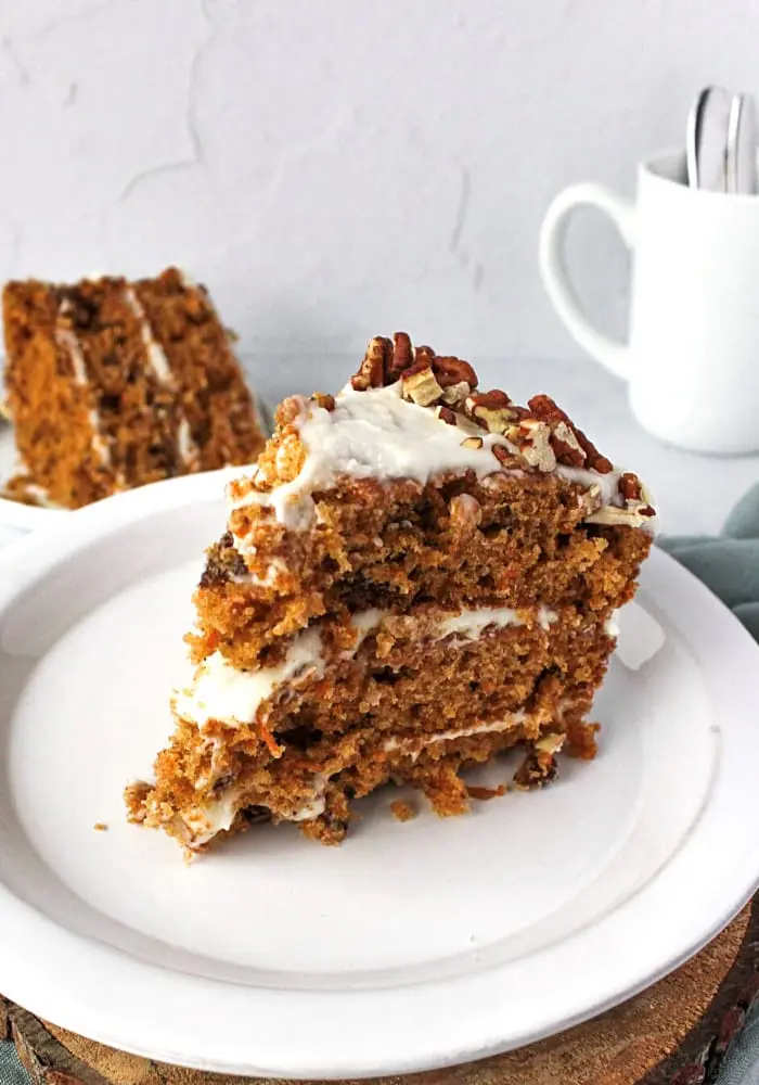 Deliciously Moist Carrot Cake: Bake Your Happy Moment! 6 Deliciously moist carrot cake slice with cream cheese frosting